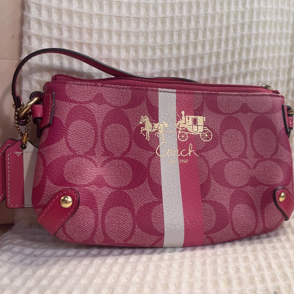 Pink coach wristlet
